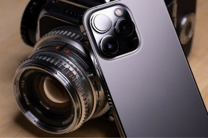 Title: Hand filming a mountain lake with a smartphone camera - Description: Hand filming a mountain lake with a smartphone camera