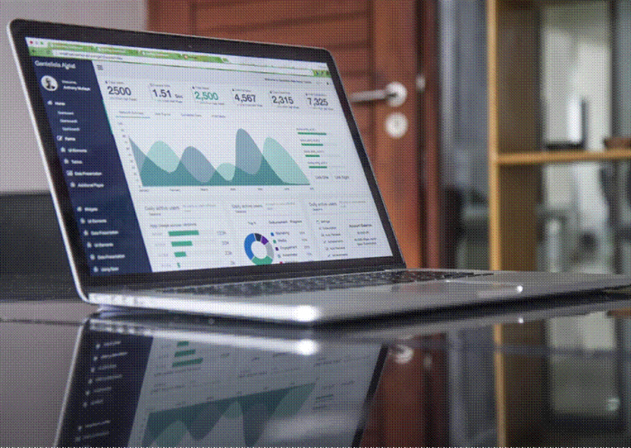 Title: analytics - Description: Laptop showing an analytics dashboard
