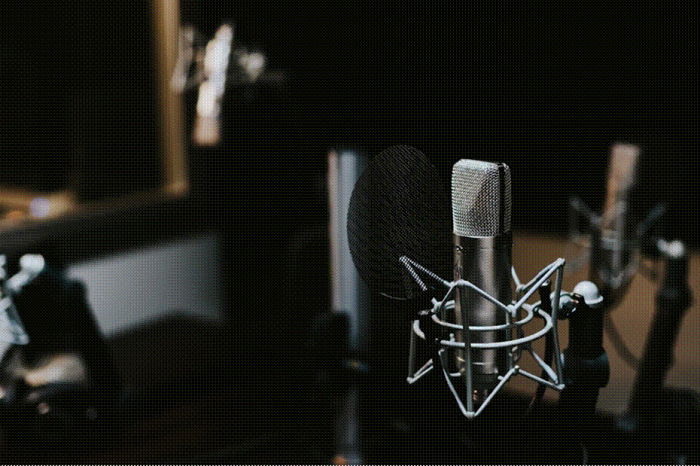 Title: Podcast microphone in a recording studio - Description: Podcast microphone in a recording studio
