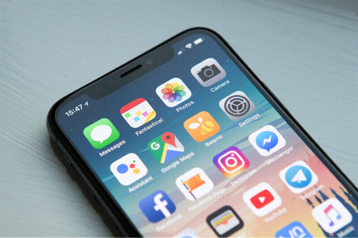 Title: Smartphone home screen filled with social media app icons - Description: Smartphone home screen filled with social media app icons